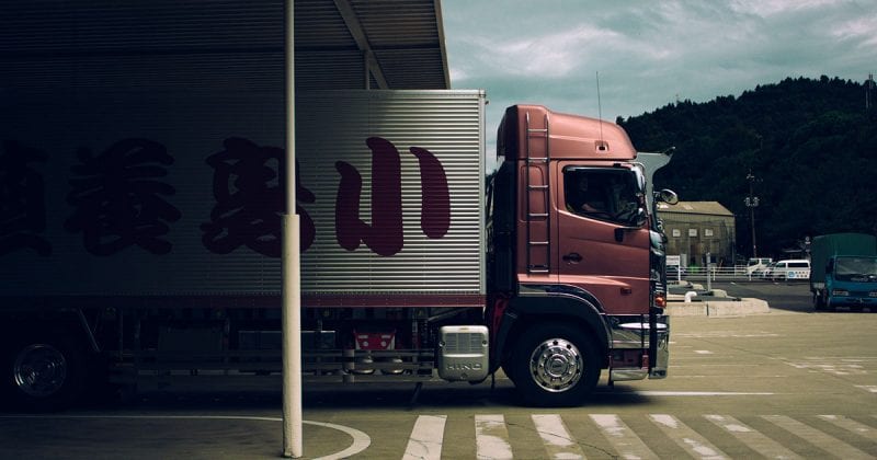 A truck pulling out of a customs checkpoint