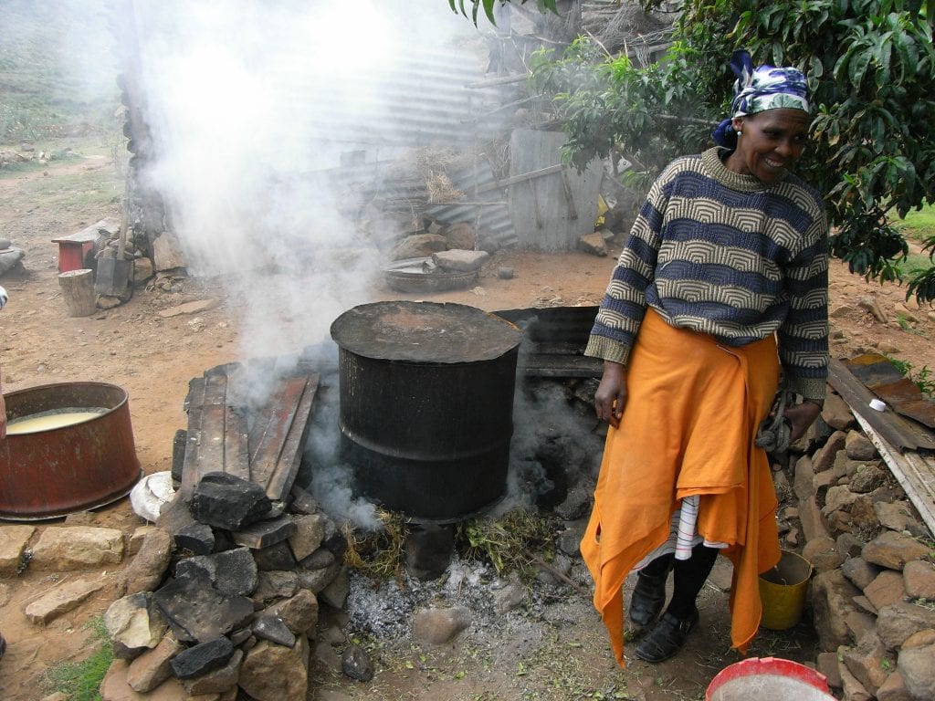 Most villagers prepare their meals over an open fire with a large amount of firewood.