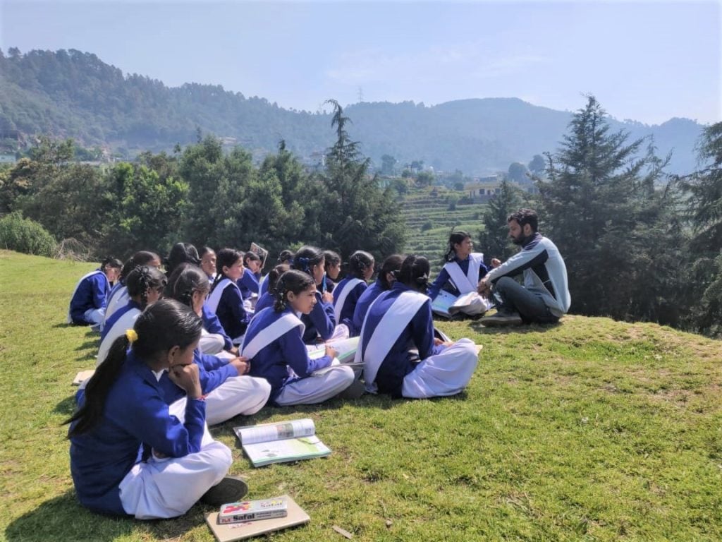 Nikhil conducting an outdoor class with the students