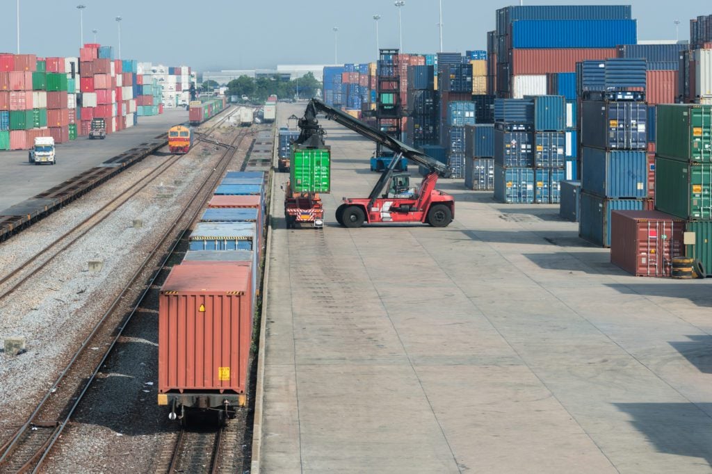 Containers loaded onto a freight train at a depot