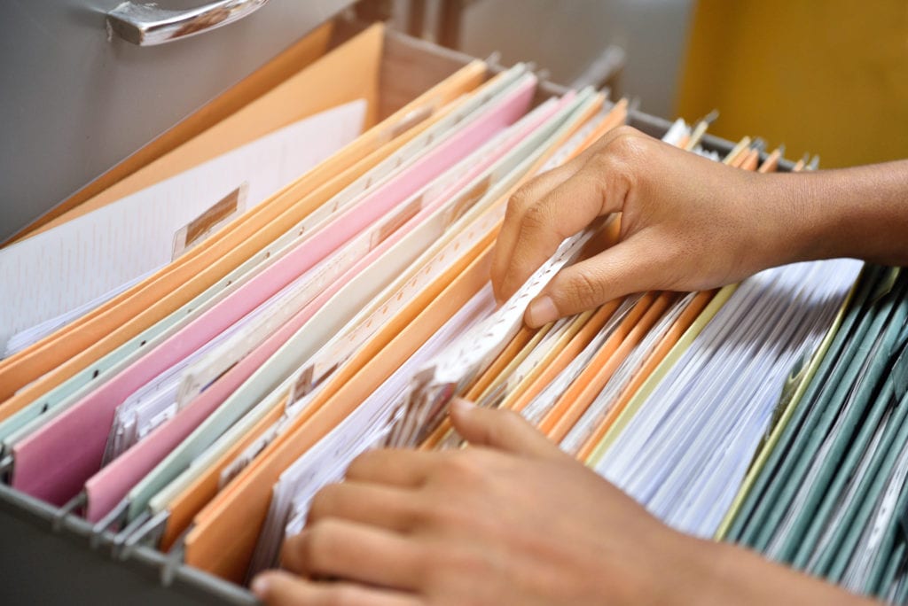 All confidential documents should be kept securely in the office.