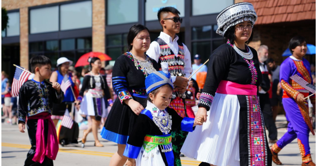 The Hmong American community in Wisconsin honor their heritage by joining the pride freedom parade in traditional Hmong costume. (Photo: Shutterstock)