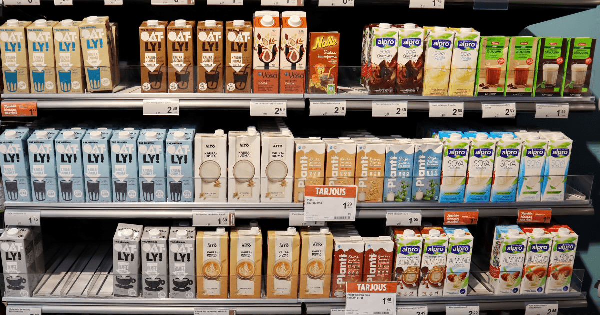 Many retailers and supermarkets now offer a wide range of plant-based milk. (Image: Shutterstock)