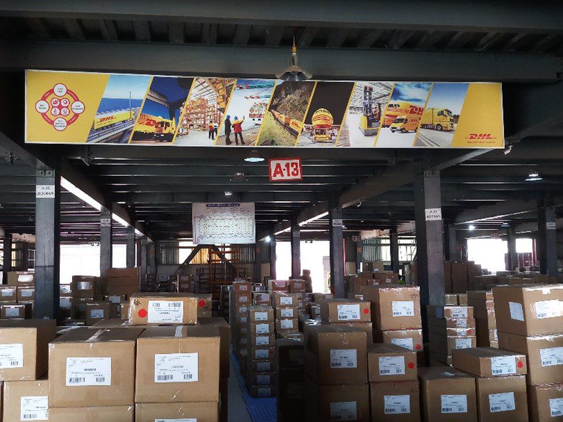 Various shipments are consolidated in the DHL container freight station to be exported overseas.