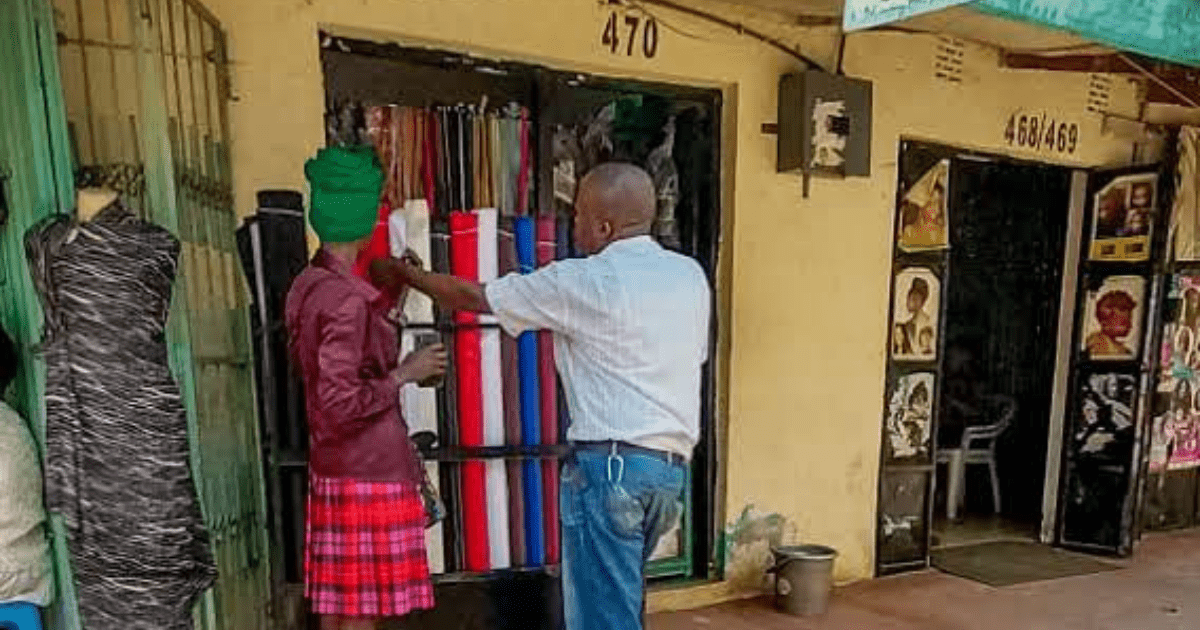 Violet doing her weekly rounds to source for fabrics from her local tailors.